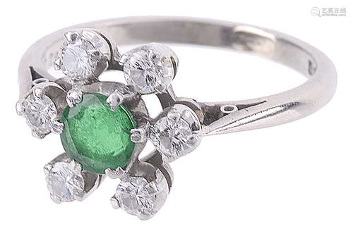 An emerald and diamond set open cluster ring