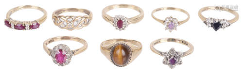 A collection of eight gold mounted gem set dress rings