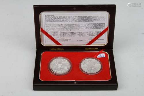 THE 60TH ANNIVERSARY OF THE ARRIVAL OF DR.BETHUNE IN CHINA COMMEMORATIVE SILVER COIN SET(TOTAL 2 COINS, WEIGHT 34g EACH WITH COVER)D:1.5