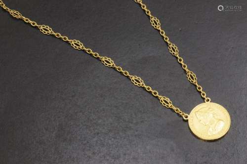 Collar de oro amarillo de 18 K. con moneda de 10 e