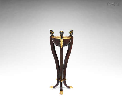 in the Empire style A large French late 19th century gilt and patinated bronze mounted mahogany jardinière en Athénienne