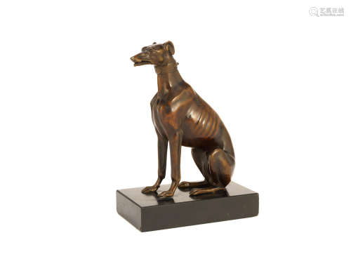 A late 19th century patinated bronze figure of a greyhound