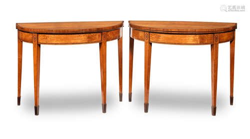 A pair of late George III satinwood and kingwood crossbanded demi-lune card tables