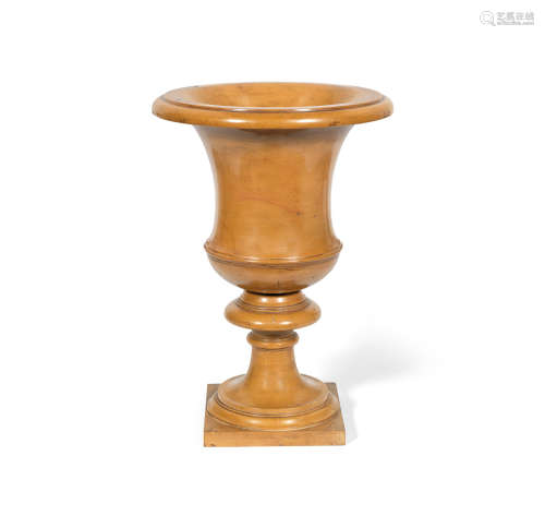 A 19th century Sienna yellow glazed stoneware urn