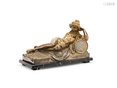 in the 19th century style A silvered bronze figure of a recumbent odalisque