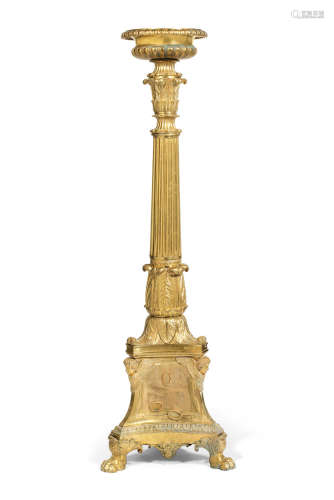 in the Empire style, probably French or Italian A 19th century gilt bronze torchiere
