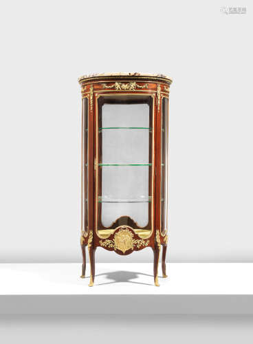A French late 19th/early 20th century gilt bronze mounted mahogany vitrine by Francois Linke (1855-1946)