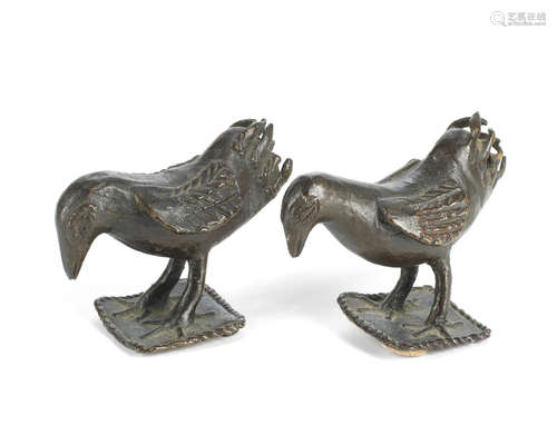 with provenance to Sir Russell Facey-Wilkinson (British 1888-1968) A pair of late 19th/early 20th Century Benin patinated bronze miniature models of birds