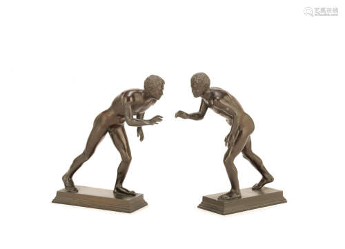 probably Naples After the Antique: A pair of late 19th century / early 20th century Italian Grand Tour bronze figures of wrestlers