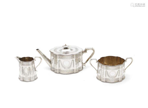 by Henry Holland, London 1875  (3) A Victorian three-piece silver tea service