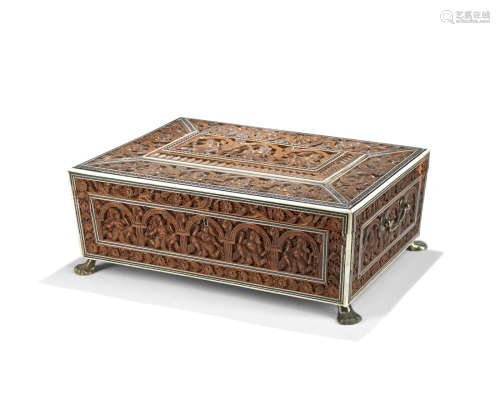 A 19th century Anglo-Indian carved sandalwood and ivory and sadeli banded work box