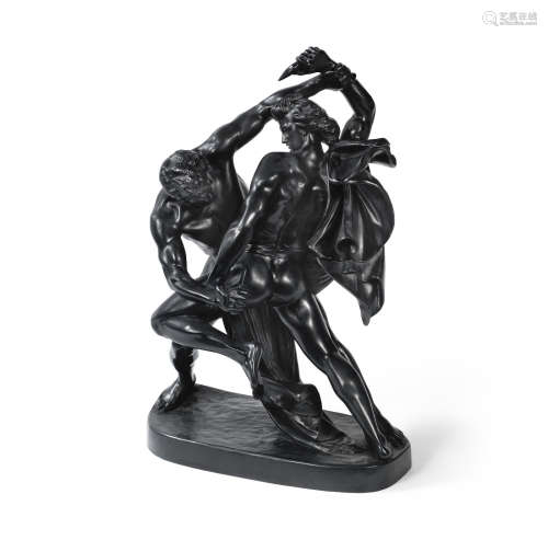 An early 20th century Ipsen, Copenhagen black glazed basalt figural group of two warriors in combat