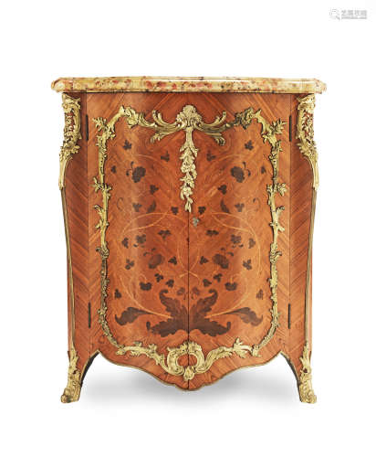in the Louis XV style A French late 19th century gilt bronze mounted kingwood, bois satine and bois de bout marquetry encoignure by Gervais Durand