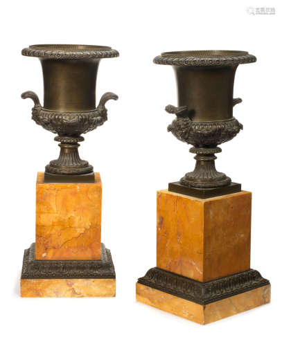 A pair of 19th century French patinated bronze and Sienna marble garniture vases