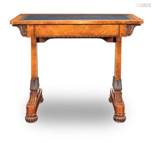 in the manner of T. and G. Seddon A William IV carved amboyna writing table