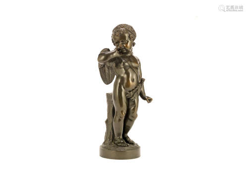 After Jean-Baptiste Pigalle (French, 1714-1785): A late 19th century patinated bronze figure of Cupid