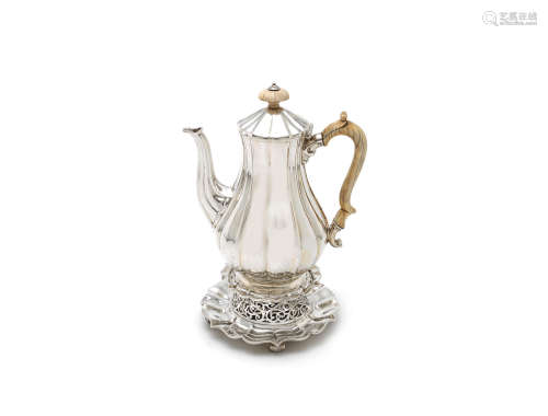 by Robert Garrard, London 1839 / 1840  A Victorian silver coffee pot and burner stand