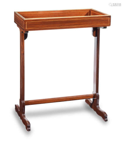 the top circa 1795, the end supports and base probably later A French mahogany tricoteuse