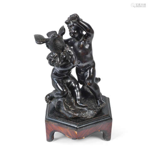 An 18th century patined bronze French figural group of two putti with a bird