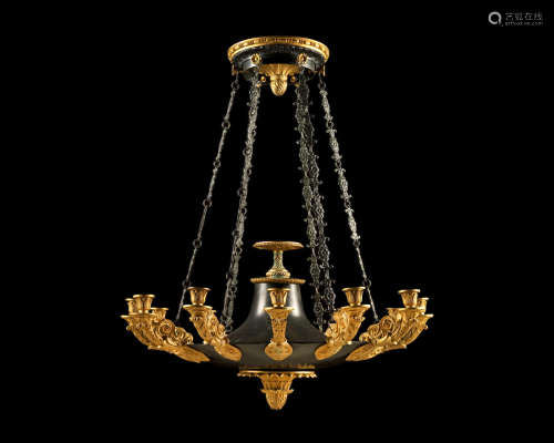 A French Restauration gilt and patinated bronze twelve-light chandelier