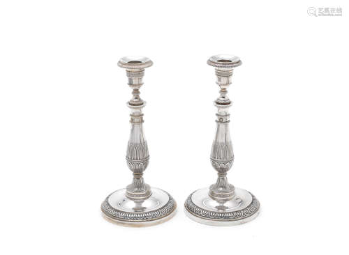 by Marc Jacquart, 1st standard Paris marks 1809 - 1819  (2) A pair of early 19th century French silver candlesticks