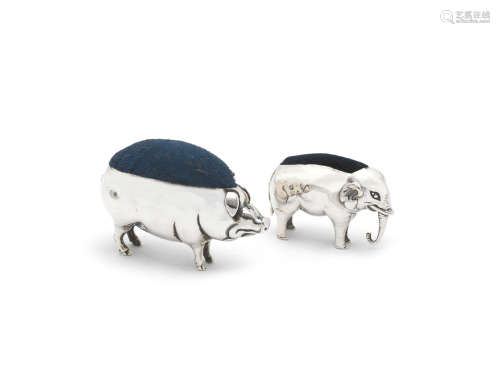 one Birmingham 1906, the other by Spurrier & Co, Birmingham 1905  (2) Two silver novelty pin cushions, modelled as an elephant and a pig