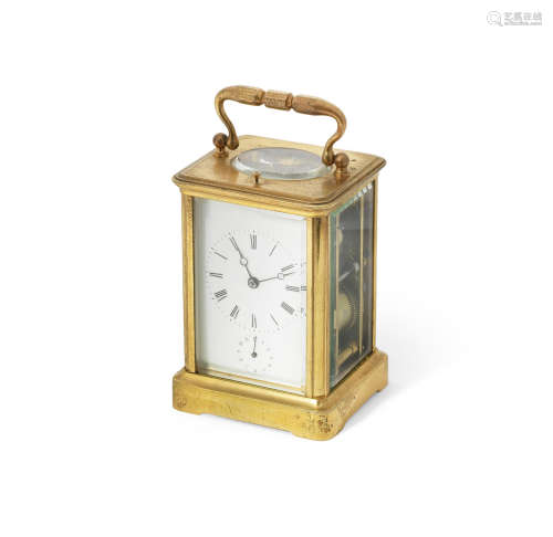 An early 20th century French gilt brass carriage clock with repeat and alarm