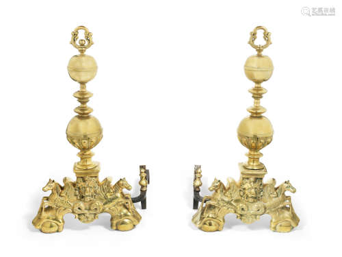 in the 17th century Dutch style A pair of late 19th / early 20th century brass and wrought iron andirons