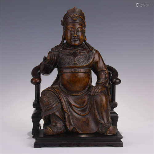 CHINESE AGALWOOD SEATED WARRIOR WITH ROSEWOOD BASE