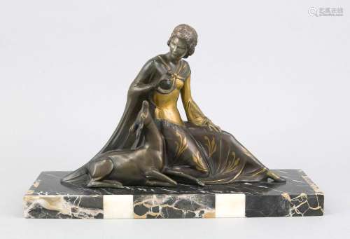 Art Deco figure group, around 1930, sitting girl with deer, patinated metal