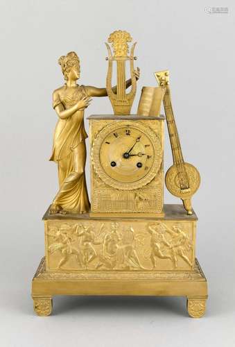 Figured pendulum clock in the Empire style, woman at harp with music book,