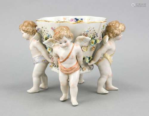 Table centerpiece, late 20th century, Four Cupids, carrying a breakthrough