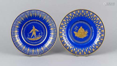 Two plates, 18th century, finely etched gold Chinese on a blue background,