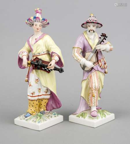 Two large figures, KPM Berlin, painters mark, a Malabarin with hurdy-gurdy,