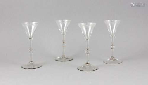 Four schnapps glasses, 18th century, round base, slender shaft, funnel-shap