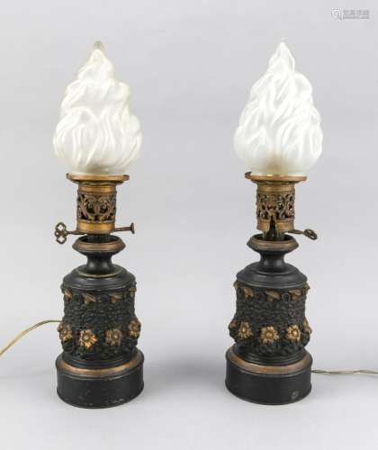 Two electrified paraffin lamps of the 19th century, floral reliefed corpus