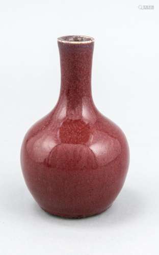 Small ox blood bottle vase, China, probably 18th century, bulbous shape wit