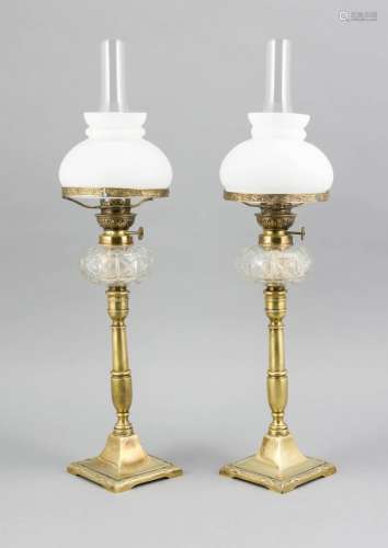 A pair of petrol lamps around 1900, brass cast, square foot, glass tanks fa