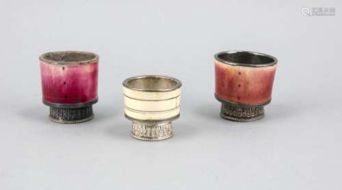 Convolute of three small cups, probably Tibet 19th century, in partly embos