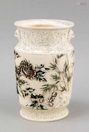 A Chinese vase around 1920, ivory carved, the cylindrical body with rock, p