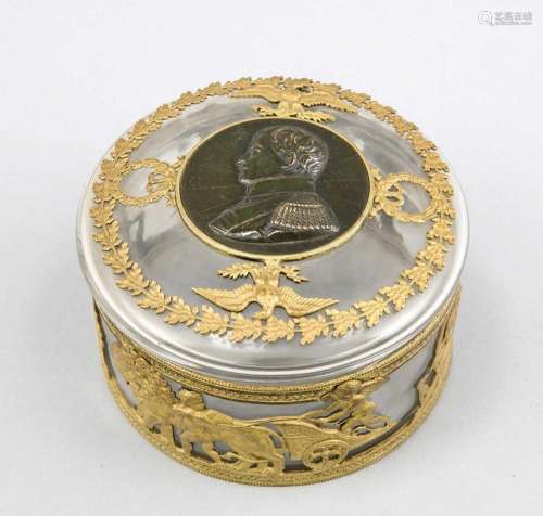 Round lidded box, 19th century, clear glass with brass fittings, figurative