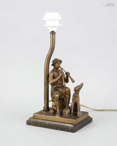 An early 20th-century lamp with shepherd and dog, white metal cast on polis