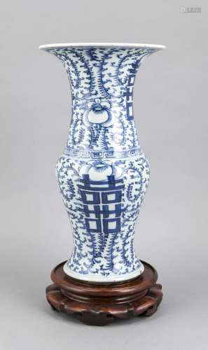 White-blue vase on wooden base, China. Export goods of the 18th century, ba