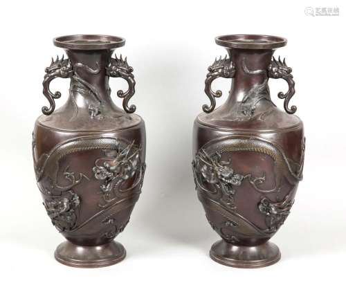 A pair of Japanese bronze floor vases, 19th century, dragons on the body, d
