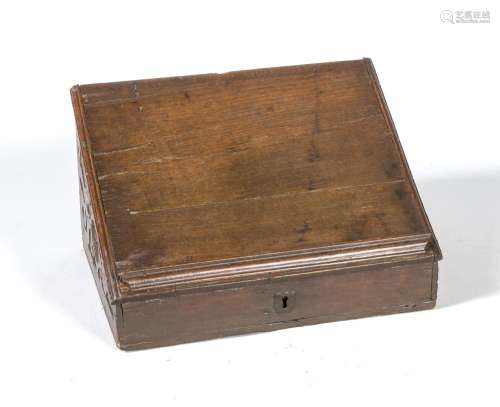 Writing desk of the 18th century, dark stained oak body with oblique writin