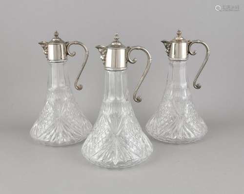 Three wine carafes, presumably England, 20th cent., mounting, plated, curve