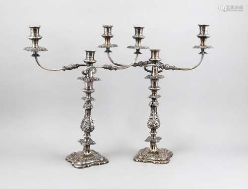 A pair of girandoles, c. 1900, silver tested, square, slightly curved stand