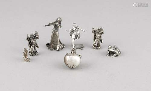 Six figures and a small bottle, 20th century, silver various fineness and t