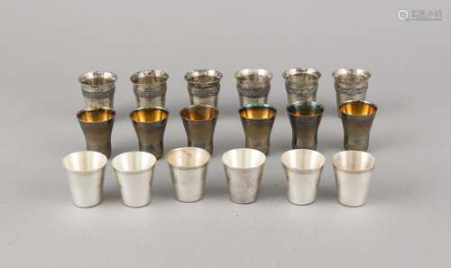 18 vodka beakers, 20th century, silver various fineness, 6 with gilding ins