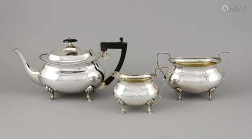 Three pieces tea set, England, 20th century, plated, on 4 feet, bulgy body,